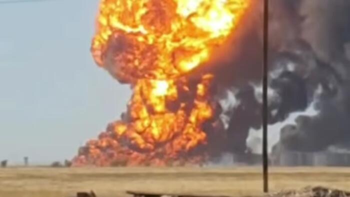 Ukrainian Drone Strike Ignites Russian Oil Depot Fire