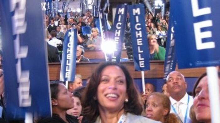 NextImg:Weird: Dems Use 16 Year Old Photo Of Kamala Surrounded By 'Michelle' Signs To Promote DNC