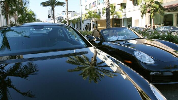 NextImg:The Clash Of The 'Dollar General' Versus 'Ferrari' Economies