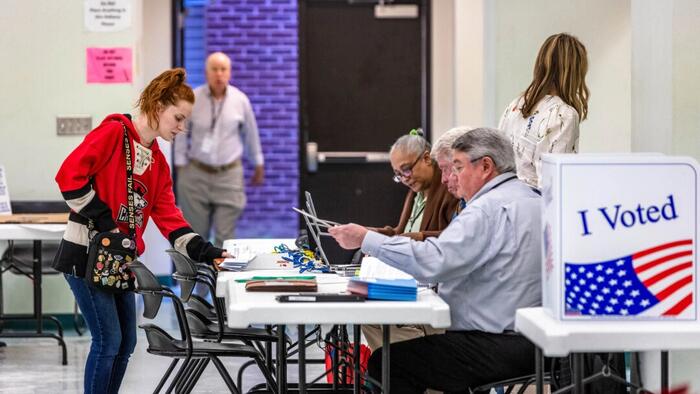 NextImg:Nearly 750,000 Purged From North Carolina's Voter Rolls, Including 130,000 Dead People And 290,000 Duplicates