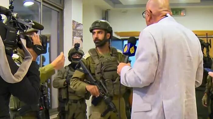 NextImg:Israeli Army Raids, Shuts Down Al Jazeera's West Bank News Room