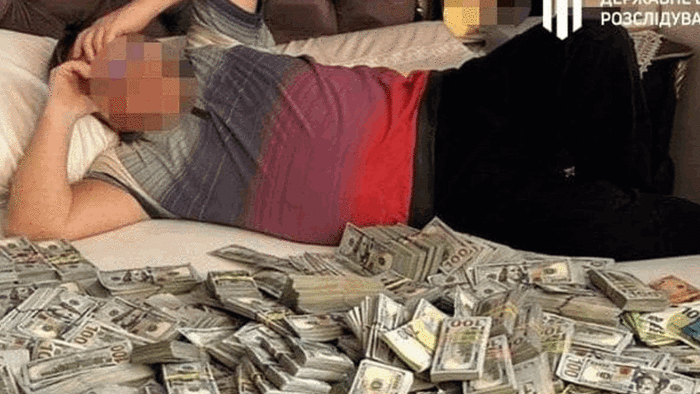 NextImg:Corrupt Ukrainian Official's Son Found Lying In Bed With Huge Sum Of Money; $6 Million Seized From Medical Fraud Op