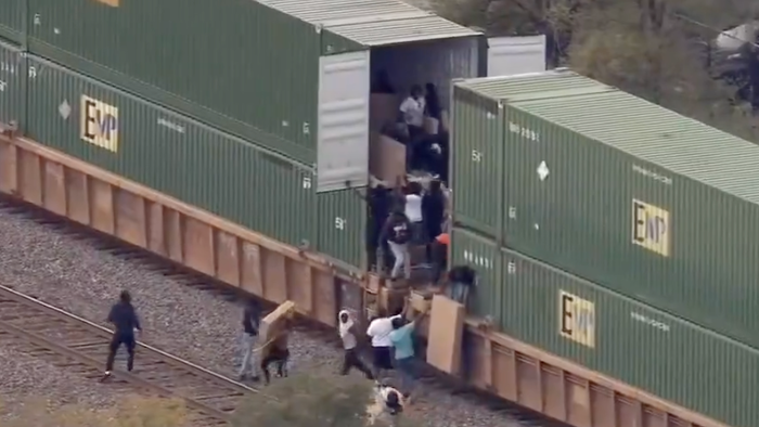 NextImg:Watch: Mob Loots Freight Train Of Flat Screen TVs In Lawless Chicago