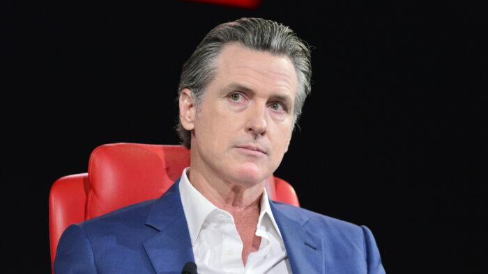 NextImg:Newsom Outlaws Voter ID Rules In California