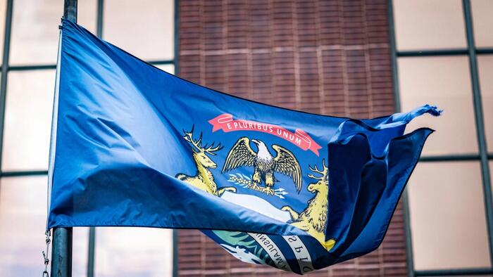 NextImg:Michigan's Early Voters Brave Long Lines, Break Records