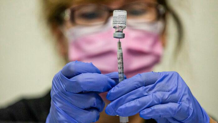 NextImg:"Skipping COVID Booster Could Reduce Your IQ": Vax Propaganda Thrives At LA Times