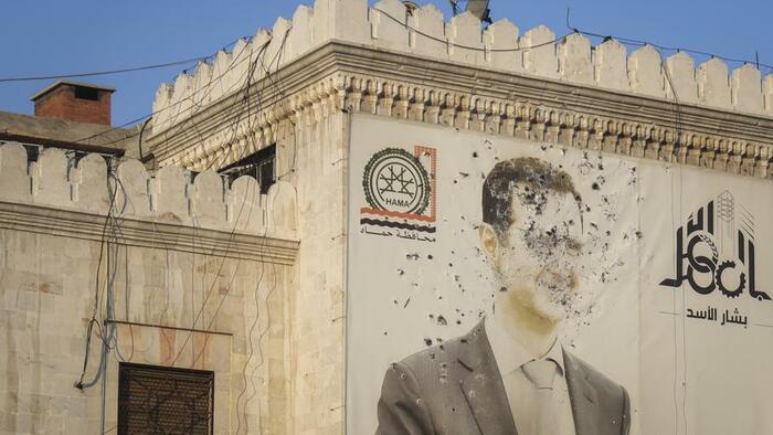 NextImg:Assad Breaks Silence From Moscow, Denies 'Planned' Syria Departure