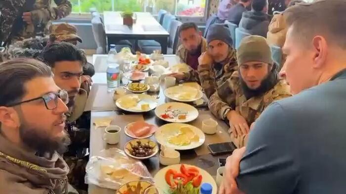 NextImg:Watch: Syrian 'Moderate Rebel' Removes ISIS Patch At Prompting Of American Journalist