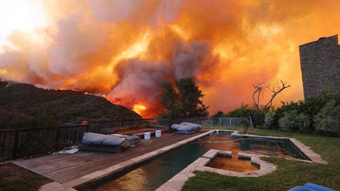 NextImg:'Evacuate Now': Fire Tears Through Upscale Pacific Palisades In Los Angeles