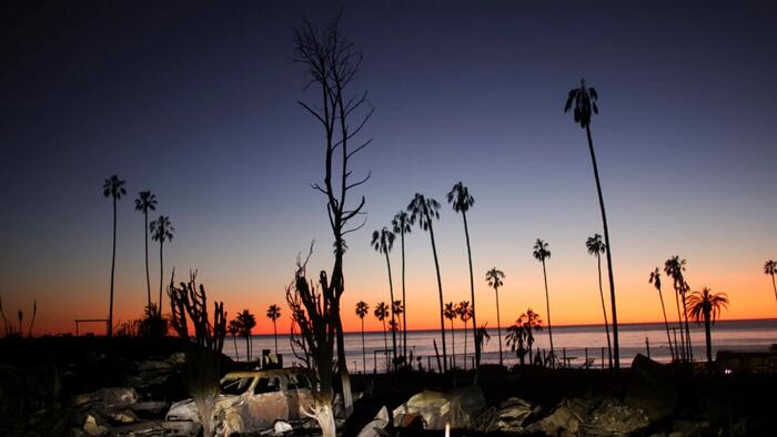 NextImg:Lithium-Ion Batteries, Melted EVs Create New Hazards In SoCal Fire Zones