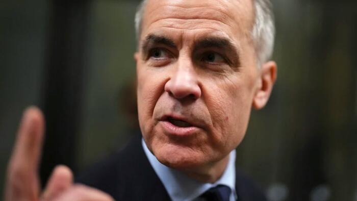 NextImg:"We're Now Facing A New Crisis" - Canada Cuts Rates (As Expected), Announces Retaliatory Tariffs