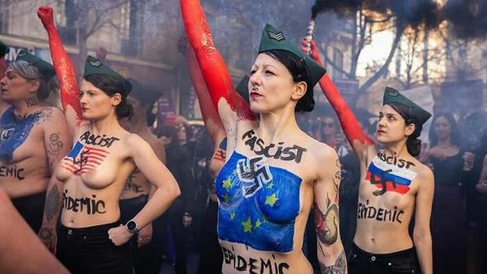 NextImg:Titty Tantrum: Topless French Women Shriek 'Heil Donald Trump, Heil Vladimir Putin, Heil Elon Musk' To Protest 'Fascist Epidemic'