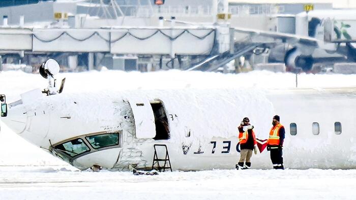 NextImg:Terrifying Details Emerge In Upside-Down Toronto Plane Crash