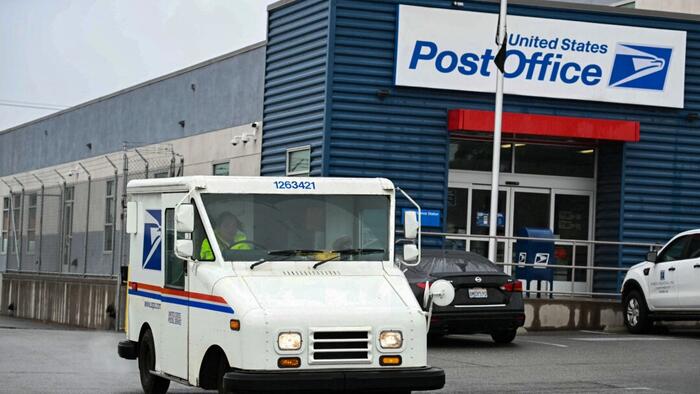 NextImg:USPS Agrees To Work With DOGE, Plans To Cut 10,000 Workers