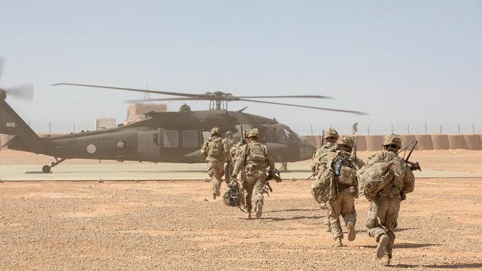 NextImg:Videos Confirm Hundreds Of American Troops Exiting Syria
