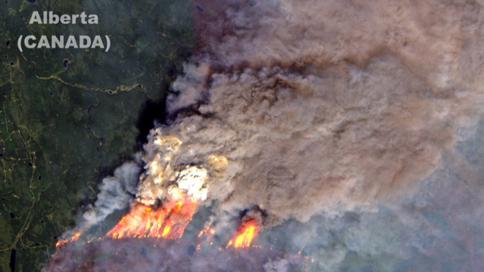 NextImg:Alberta Wildfires Threaten Oil Sands Output; Energy Experts Closely Monitoring Inferno