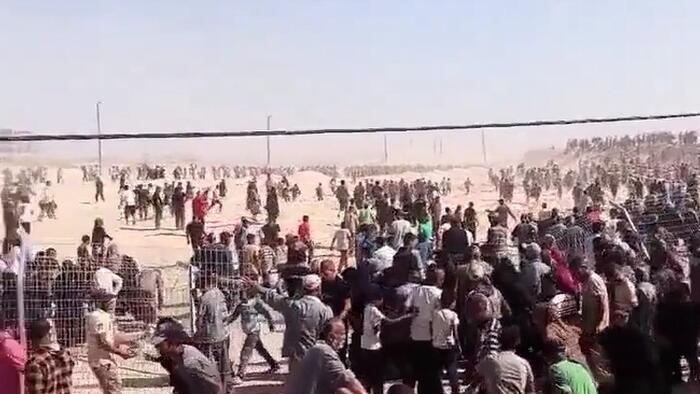 NextImg:Shots Fired, American Contractors Flee, As Starving Palestinians Overrun Aid Distribution Site