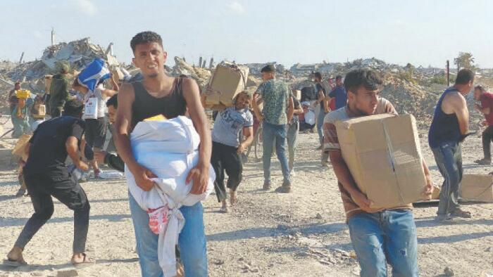 NextImg:US Group Suspends Gaza Operations After All Hell Broke Loose At Aid Site