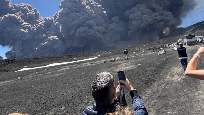 NextImg:Tourists Flee As Mount Etna Erupts In Italy