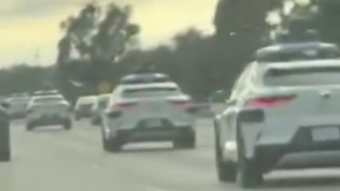 NextImg:Viral Footage Appears To Show Waymo Vehicles Fleeing Los Angeles After Riots 