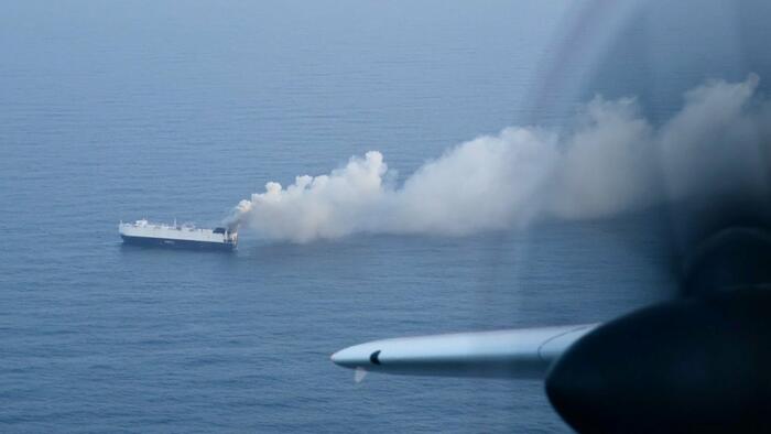 NextImg:New Footage Shows Abandoned Cargo Ship Laden With Chinese Cars Burning In Pacific