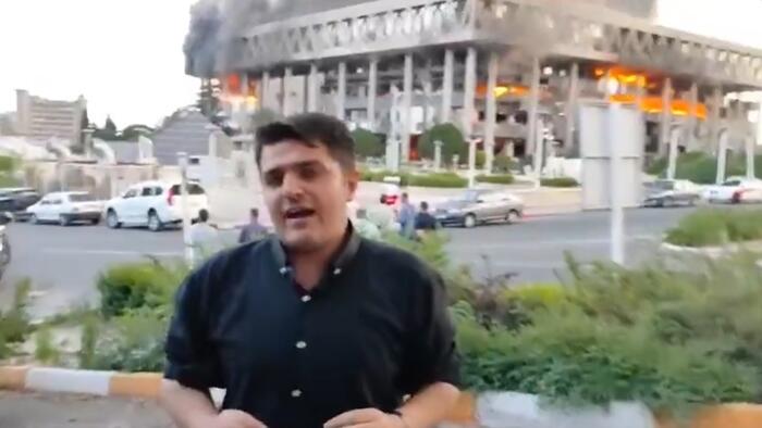 NextImg:Watch: Anchor Flees Studio Mid-Broadcast As Iran TV Building Bombed