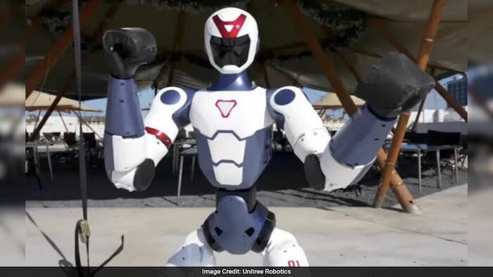 NextImg:Watch: China Robot Giant Unveils Tesla Optimus Killer That Can Fist-Fight