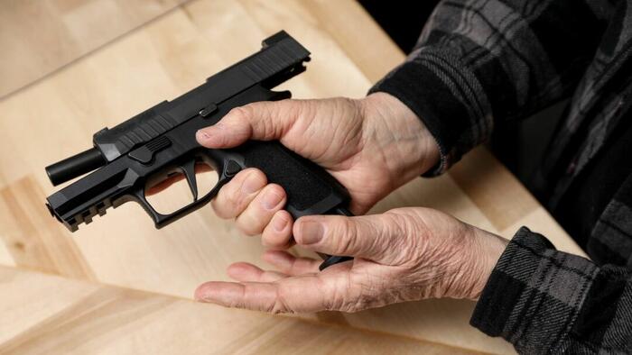 NextImg:Air Force Investigating Whether Sig Sauer Pistol Was A Factor In Airman's Death