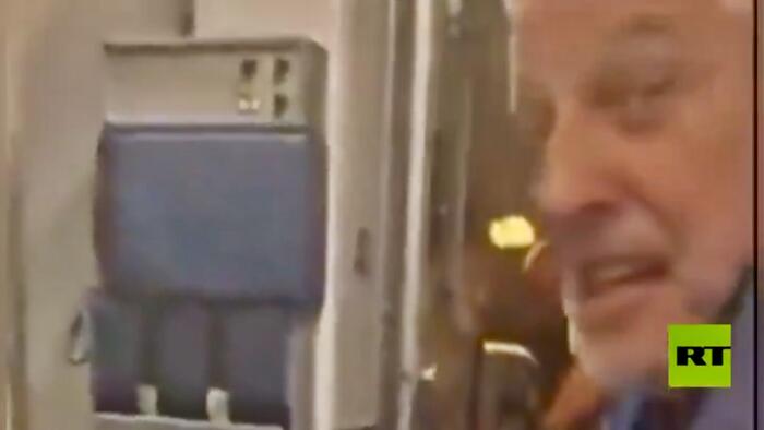 NextImg:Delta Passengers Stunned As Pilot Hauled Off Plane On Child Porn Charges