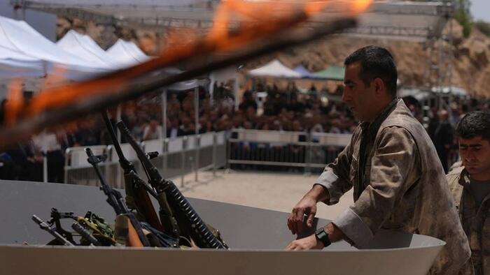 NextImg:Turkey's Outlawed PKK Begins 'Symbolic' Disarmament By Burning Weapons
