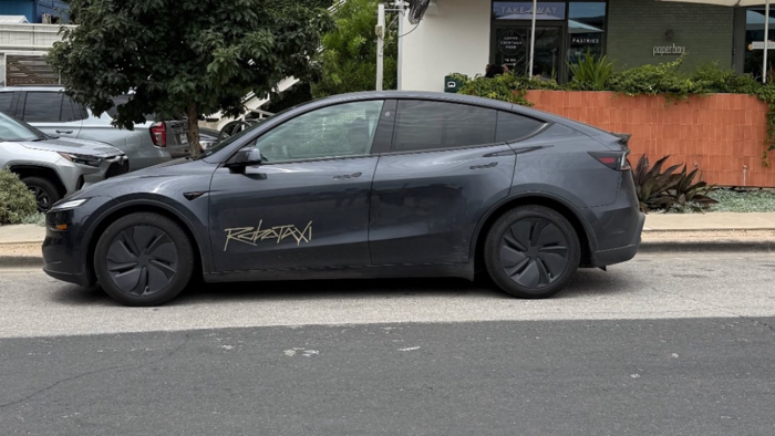 NextImg:Tesla Shares Jump As Robotaxi Secures Texas Rideshare Permit