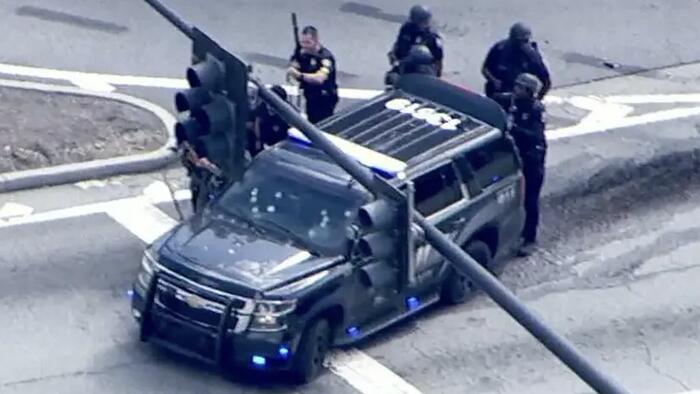 NextImg:Enraged Over Purported COVID Vax Injury, Gunman Attacks CDC, Kills Cop