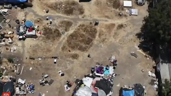 NextImg:Homeless Camps Are Morphing Into Larger Homeless 'Cities' In LA