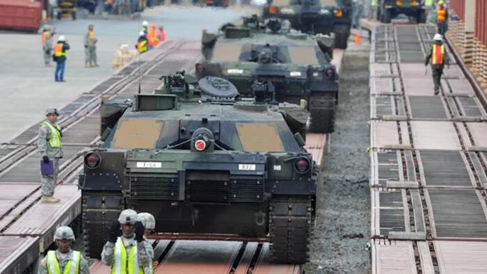 NextImg:Poland Receives Single Largest Delivery Of M1 Abrams Tanks From US