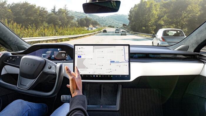 NextImg:NHTSA Probing Tesla Full Self-Driving After Reports Of Red-Light Runs, Collisions