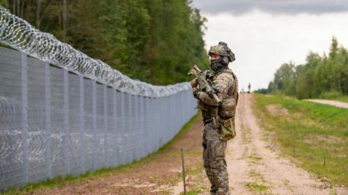 Latvia Hails Completion Of 175-Mile Fence Along Russian Border