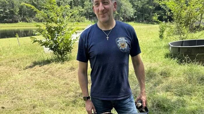 UK Man Arrested For Posing With Gun In Photo Taken While In The US UK Man Arrested For Posing With Gun In Photo Taken While In The US