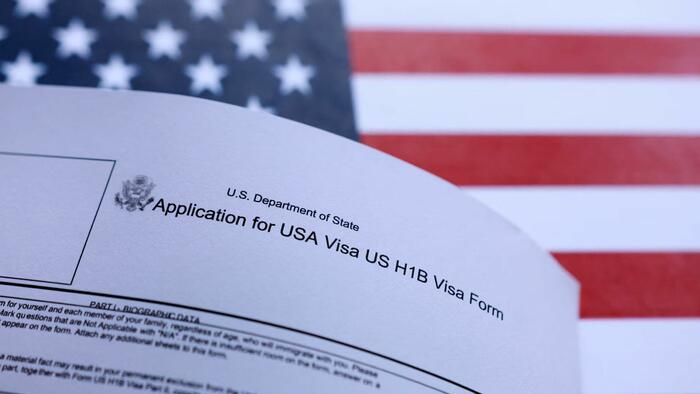 Trump Admin Proposes New $100K H-1B Fee To Offset Immigration Enforcement Costs