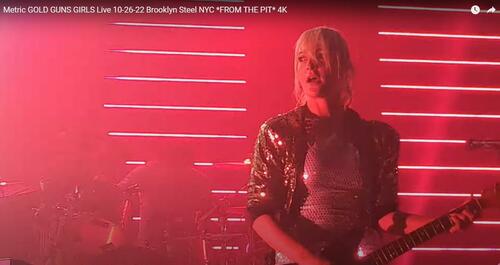 Metric performing "Gold, Guns, Girls" in Brooklyn last week (YouTube).