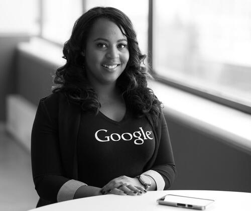 A woman wearing a Google shirt.