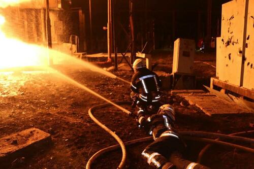 Firefighters attempting to put out a fire at a power plant in Kharkov