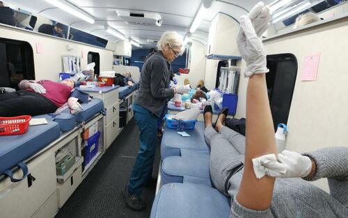 Nonprofit Blood Donation Service Starts Matching Unvaccinated Patients With Donors Nurse-Georgia-covid-march-31-7-1200x753