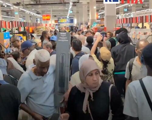 Multicultural French Crowds Brawl Over Discount Air Conditioners As Heatwave Looms