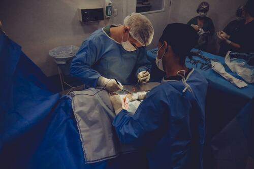 A surgeon operating.