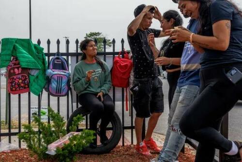 Asylum seekers from Venezuela await work permits on June 28, 2023 (via the Chicago Tribune)