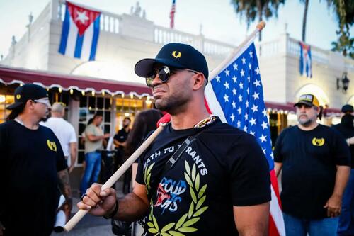 Henry "Enrique" Tarrio, then leader of The Proud Boys, holds a U.S. flag during a protest showing support for Cubans demonstrating against their government, in Miami, Florida on July 16, 2021. (EVA MARIE UZCATEGUI/AFP via Getty Images)