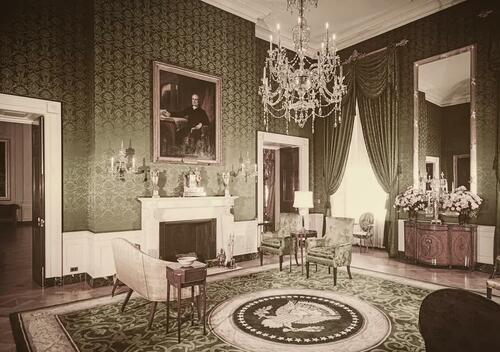 The Green Room in the White House in Washington, circa 1962. A portrait of President John Quincy Adams by George P.A. Healy hangs above the fireplace. (Archive Photos/Getty Images)