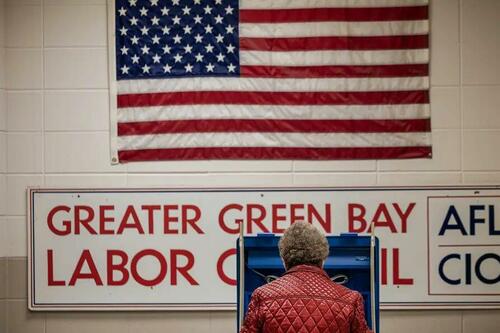 A woman casts her ballot in the state's primary election in Green Bay, Wis., on April 2, 2024. (Thos Robinson/Getty Images for The Democratic National Committee, Scott Olson/Getty Images)