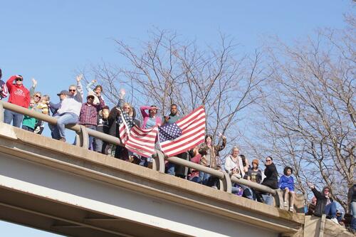 US Trucker Convoy Swells As It Moves Across Country To DC Overpass2-1200x800