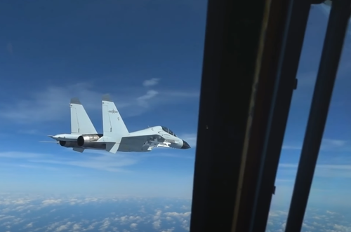Watch: Chinese Fighter Threatens US Spy Plane Over Regional Waters, Coming Within 20 Feet